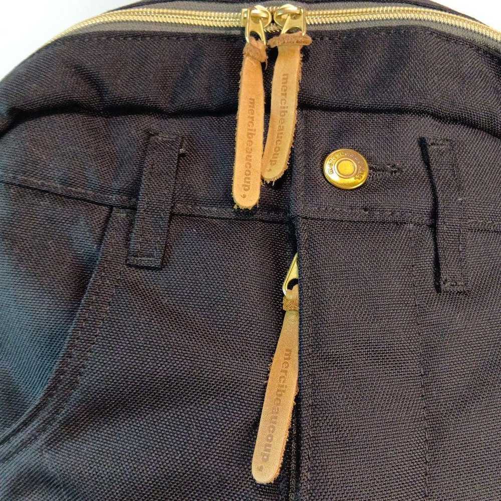 Merci Beaucoup's denim-style backpack. - image 3