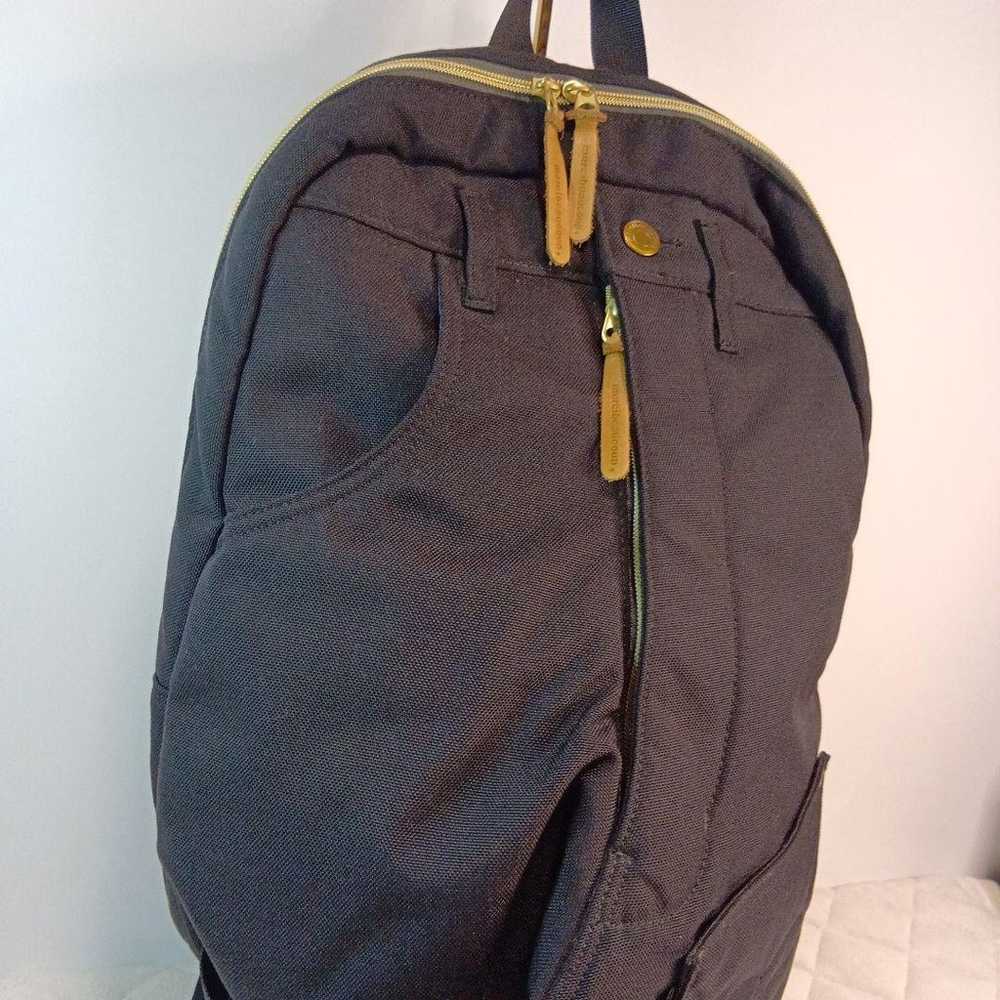 Merci Beaucoup's denim-style backpack. - image 7