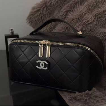 CHANEL Black Quilted Pouch