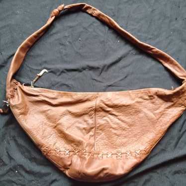 brown leather shoulder bag.