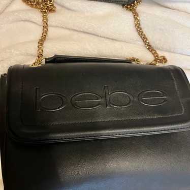 Bebe black and gold purse