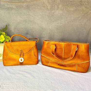 Set of Tommy Bahama handbags in camel color