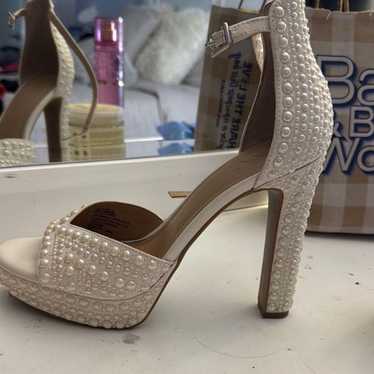 Pearl white high heels with strap