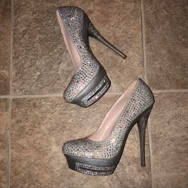 Size 5.5 jeweled high heels. New without