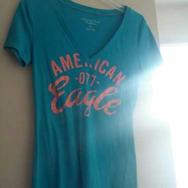 V-neck American Eagle shirt.