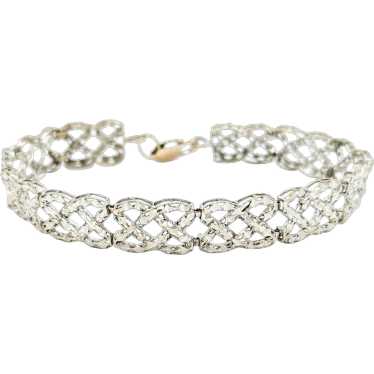 Captivating Woven Diamond Cut Bracelet in 10k Whit