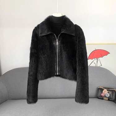 Black fur short jacket.