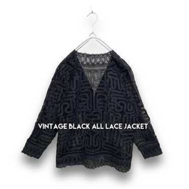 Vintage lace all-over black jacket cardigan.