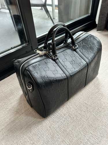 Gucci Black Leather GG Embossed Duffle