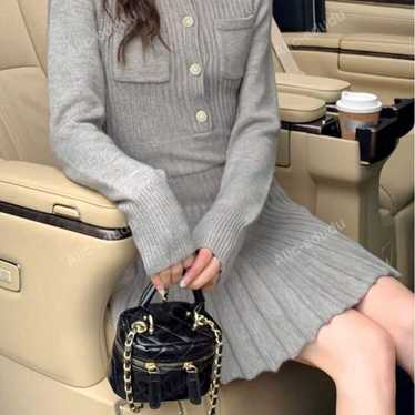 Gray ribbed long-sleeve knit dress.