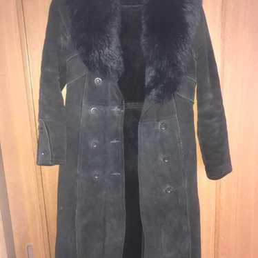 Black long coat with fur attached.