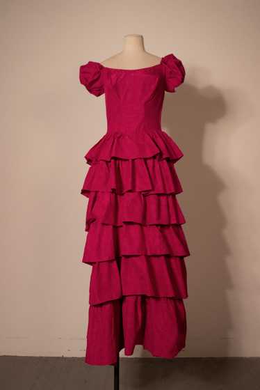 Magenta vintage puff sleeved corsetted ruffled gow