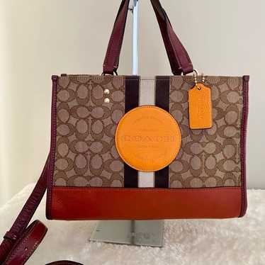 Coach Dempsey Carryall purse in Signature Jacquard