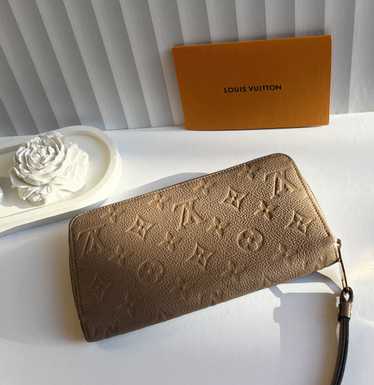 Louis Vuitton Authentic LV Zippy wallet empreinte