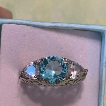 Blue and white topaz ring