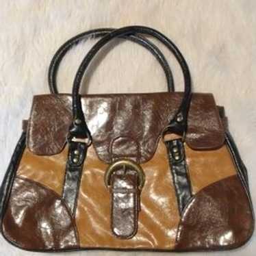 Brown And Tan Satchel With Structured Design - image 1
