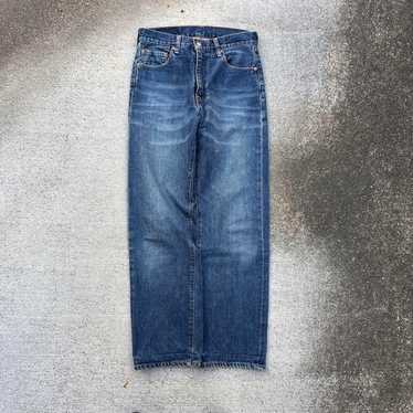 90s Vintage Japan Made Levi's 702 XX Denim Pants in Indigo