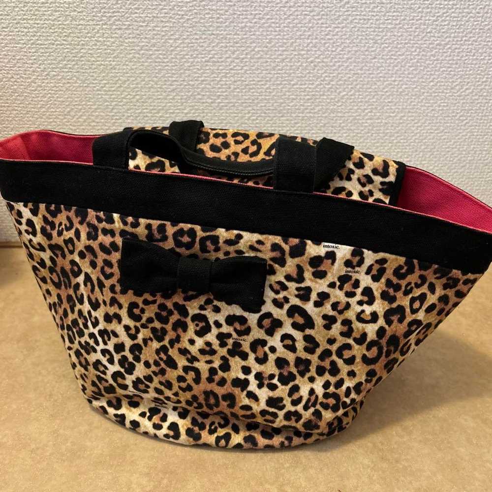 Price reduction ☆ intoxic. Intoxic tote mini leop… - image 3