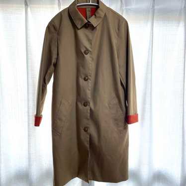 Human woman trench coat