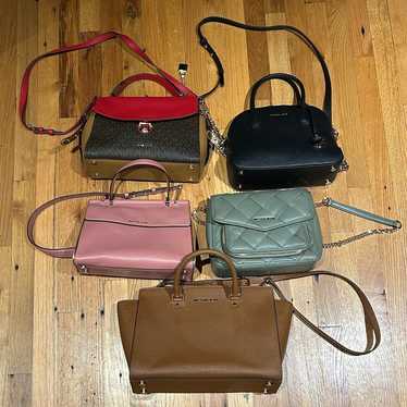 Bundle of five Michael Kors purses