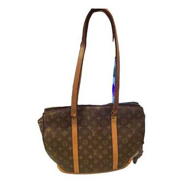 Louis Vuitton Leather travel bag