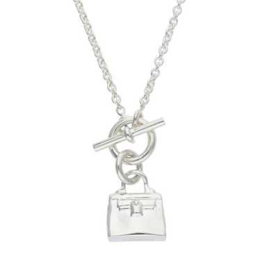 （HERMES）Fusion Amulette Kelly pendant GM Fusion Amulette Kelly pendant, large model | Hermès UAE