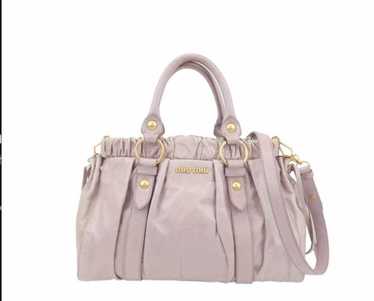 SS1999 Miu Miu silver technical crossbody bag – elevated