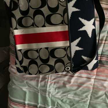 Coach Handbag Use But Still In Fair Condition.