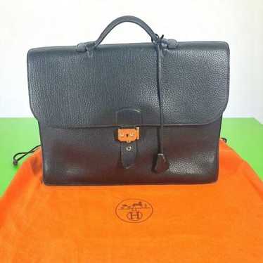 フランス発【HERMES】Portefeuille Hermes Clochette / ブラック Clochette Buckle long necklace | Hermès USA
