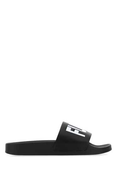 【送料&関税込】Ganni Black Rubber Slippers Ganni Black Rubber Slippers | italist