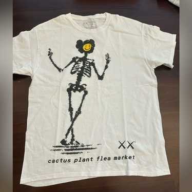 KAWS × Cactus Plant Flea Market T-shirt ○関税・送料無料○ KAWS x Cactus Plant Flea Market T-shirt Black Men's - FW21 - US