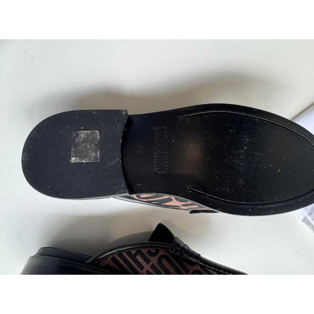 Moschino Leather mules & clogs