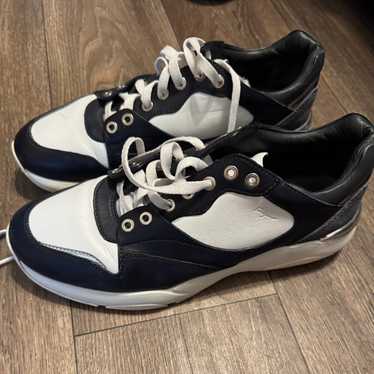 スニーカー FERRAGAMO SNEAKER (029835780989M NERSTR) Men's Sneakers and Slip On | Ferragamo US