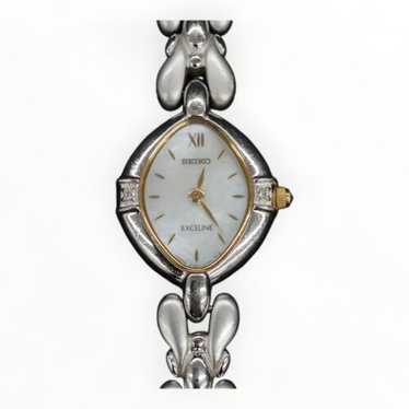 Seiko Exceline 1F20‑6B60 シルバー ゴールド Seiko Exceline Diamond 1F20-6B60 Vintage Women's Watch in