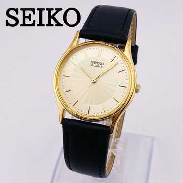 Seiko unisex gold v701-7021 - Gem