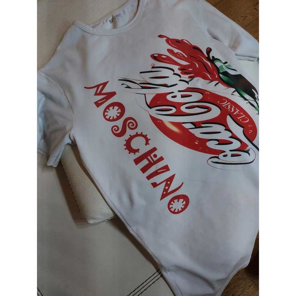 Moschino フリントニットトレス 242D04855403 1002BIANCO Moschino black knit sweater Flintstones Pebbles Bam Bam Size