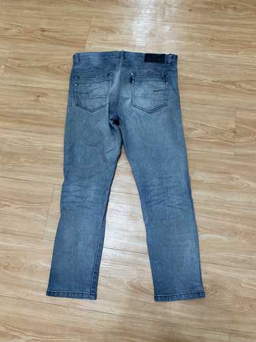 Distressed denim × tornado - Gem