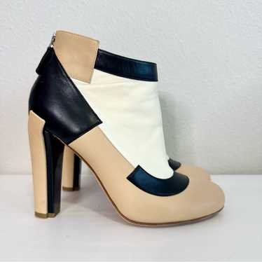 Treasures of NYC - Chanel Orange Logo Heels