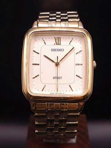 時計 SEIKO SPIRIT 7N01-7060 QUARTZ SEIKO Spirit 7N01-7060 Gold Dial 93 Tokyo Quartz Men's Watch