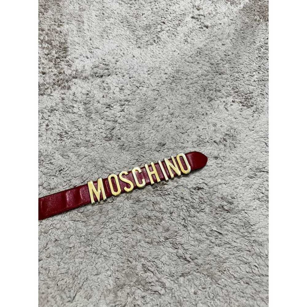 MOSCHINO ベルト Moschino Redwall Swiss Appenzeller style belt with cows