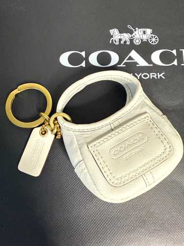 買取り実績  Coach Gem - azure mini ergo 小物