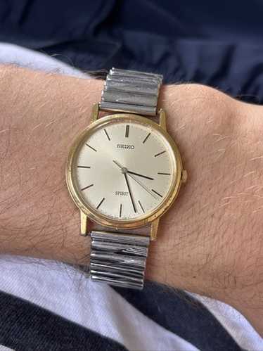 時計 SEIKO SPIRIT 7N01-7060 QUARTZ SEIKO Spirit 7N01-7060 Gold Dial 93 Tokyo Quartz Men's Watch