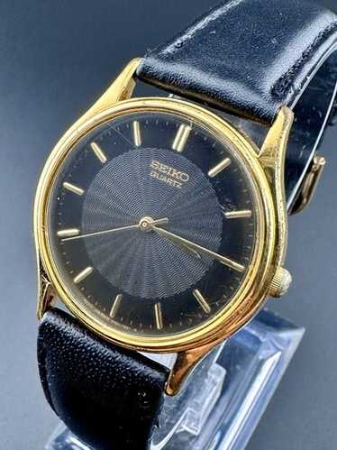 Seiko unisex gold v701-7021 - Gem