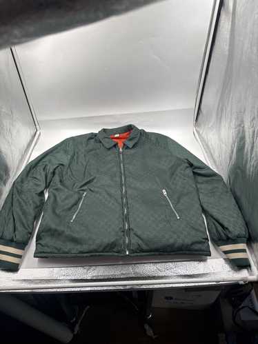ジャケット・アウター GUCCI Reversible Nylon Bomber Jacket Reversible nylon canvas jacket in dark blue | GUCCI® US
