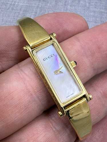 稼働 GUCCI 腕時計 1500L ゴールド文字盤 バングル レディース 38 GUCCI - GUCCI グッチ 1500 スクエア バングルウォッチ 黒文字盤