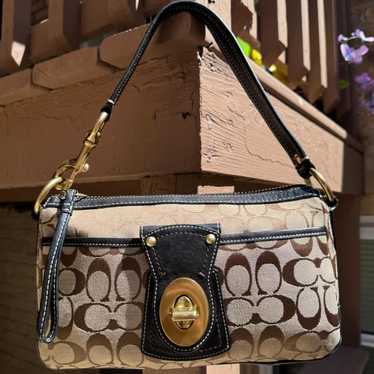 Coach legacy 65th turnrock - Gem