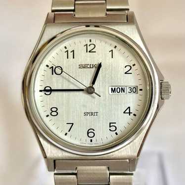 時計 SEIKO SPIRIT 7N48-7000 QUARTZ 10 BAR Seiko Spirit 7N48-7000 Quartz 10BAR Gold Dial Men's Watch