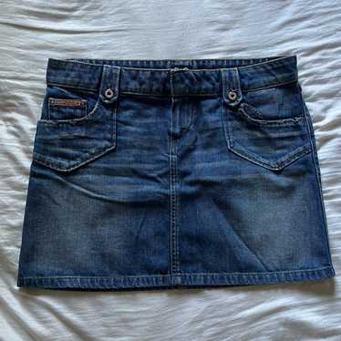 スカート Dolce & Gabbana SS25 Denim skirt (F4CYADG8MS5 S9001) Denim mini skirt with rips in Blue for Women | Dolce&Gabbana® US