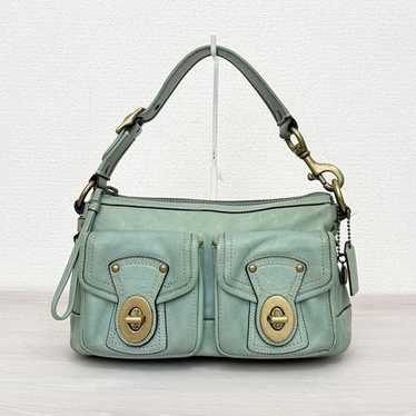 Coach legacy 65th turnrock - Gem