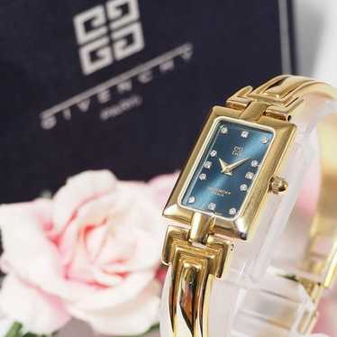 Givenchy gold navy dial - Gem